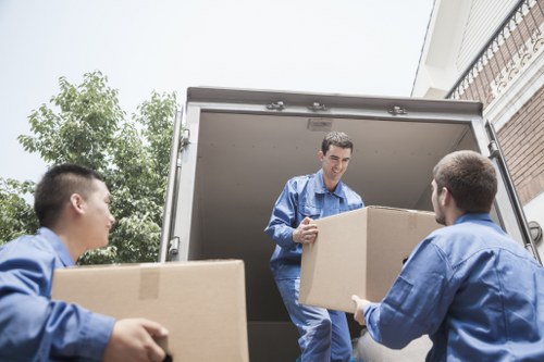 Packed boxes and furniture ready for local house removals in Catford