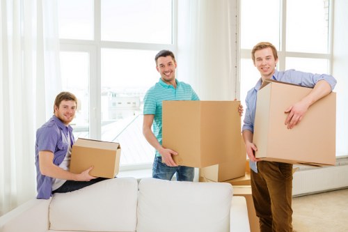 Local moving team handling boxes near Catford homes