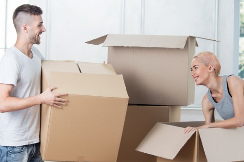 Residential packing team handling fragile items in Catford