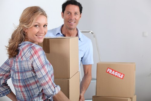 Packed boxes and furniture ready for a local move in Catford