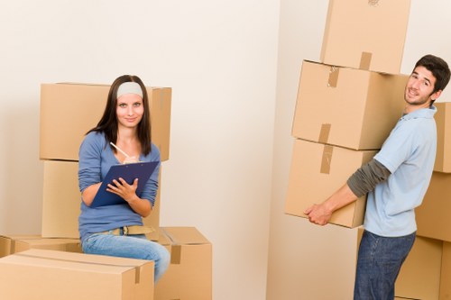 Furniture and boxes being loaded into a removals van